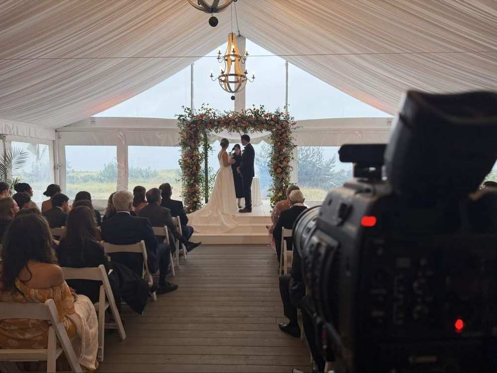 Wedding ceremony framed through a professional cinema camera