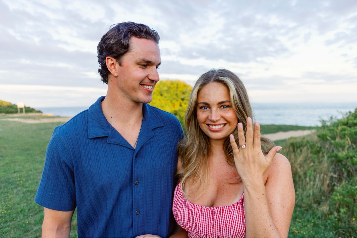 Bride-to-be showing her engagement ring during an engagement session on Long Island