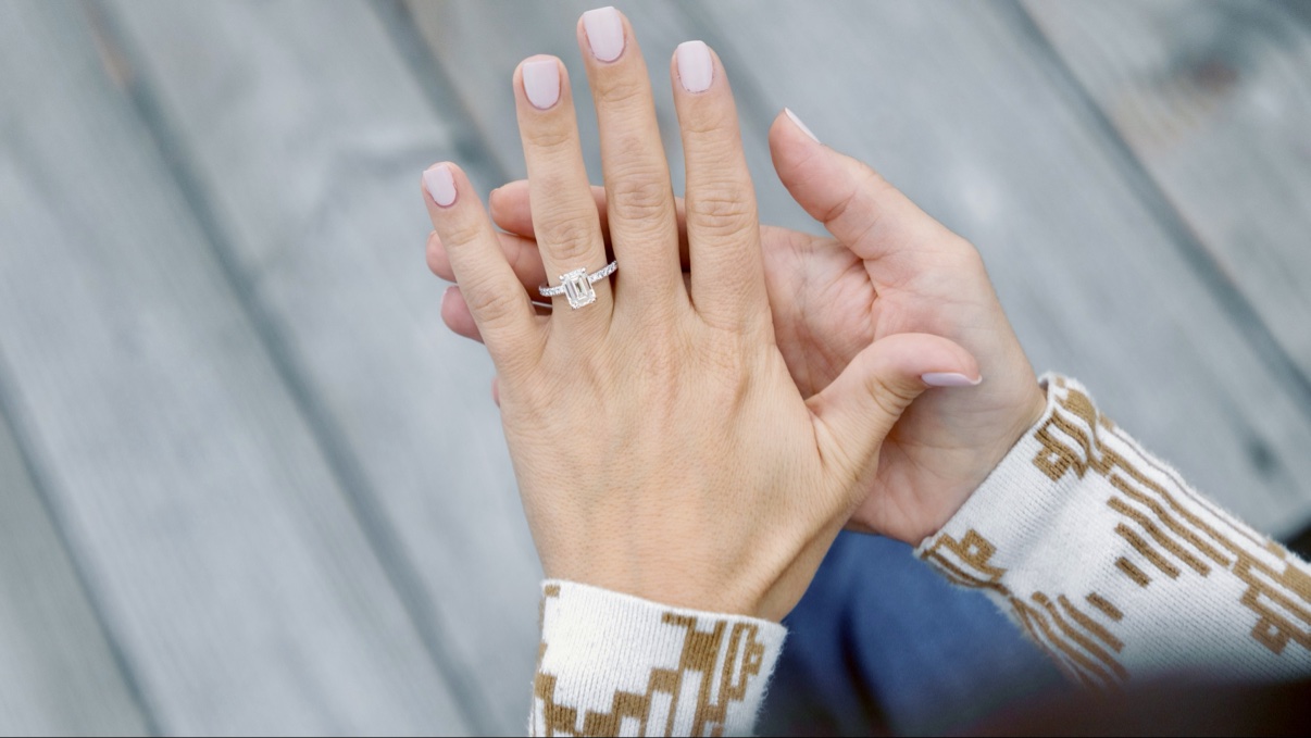 Close-up of a new engagement ring during a surprise proposal in Sag Harbor, Long Island