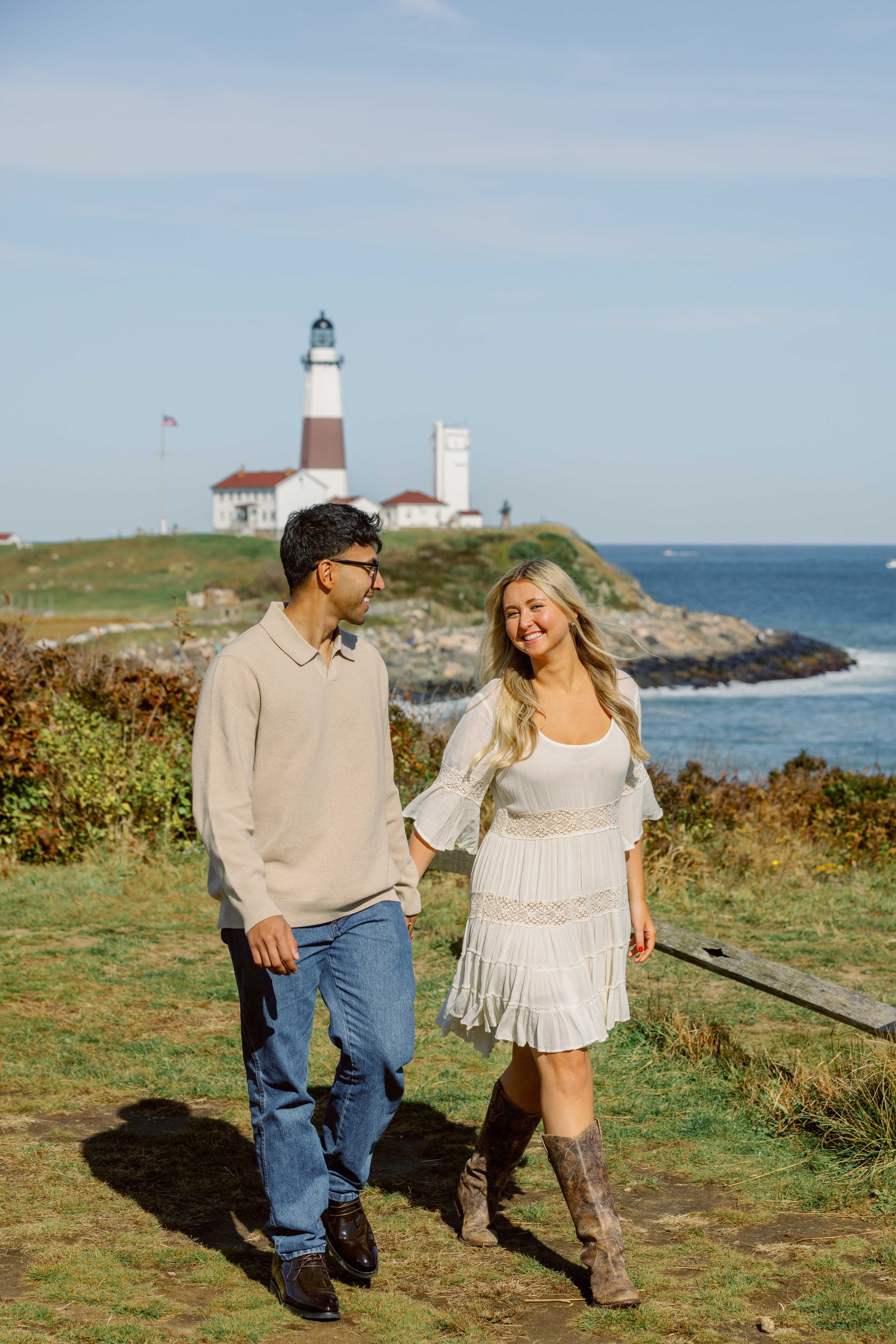Engagement portrait below the Montauk Lighthouse